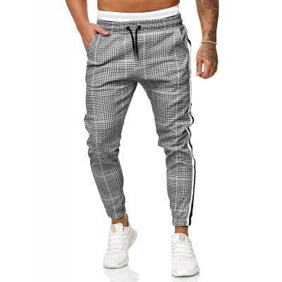 China Anti-Wrinkle Men's Slim Cargo Pants Men's Casual Slim Cargo Pants Men's Clothing Print Lace Wear Outdoor Waistband Man Pants Casual Sport for sale