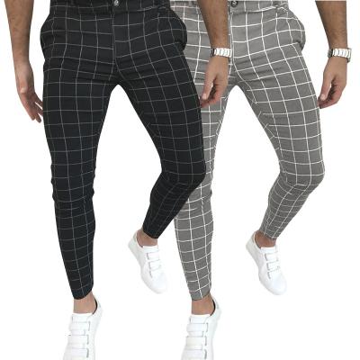 China New Anti-Wrinkle Placket Pants Button Placket Men Plaid Pants Zipper Style All-match Fashionable Mens Plaid Track Pants for sale