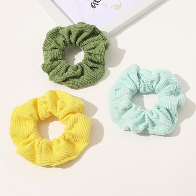 China New environmental friendly wholesale ring large intestine simple barred hair knit tie flower high elastic hair cotton scrunchies for sale