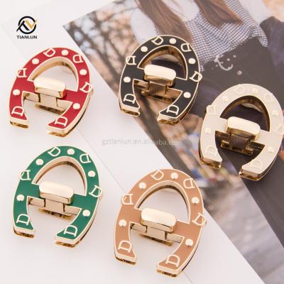 China Custom Logo Metal Bag High Quality Alloy Handbag Push Lock Metal Turn Twist Lock Eco-friendly For Women Bag for sale