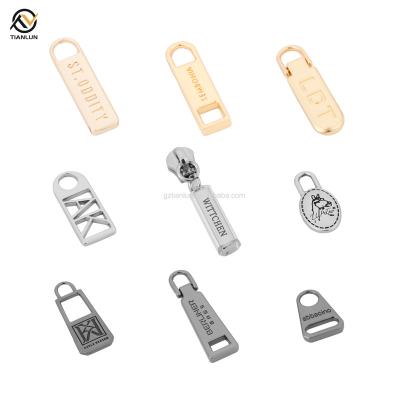 China Custom Logo Pulls Head For Handbag Metal Garment Zipper Slider Bag High Quality Eco-friendly Zipper Puller for sale