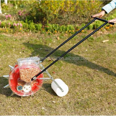 China 2018 New Arrival Hand Push Seeder Plastic Seed Planter Machine Bean Peanut Peanut Plastic Planter for sale