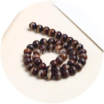 China Agate Round Shape Stone Brown Football Dzi Beads For Jewelry & DIY Crafts Making for sale