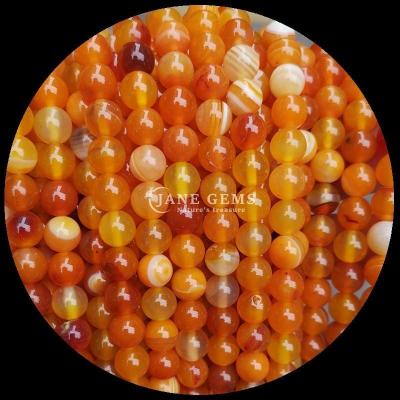 Chine Perles de pierre précieuse à coupe ronde multicolore Agate à rayures bleu jaune pour la fabrication de bijoux et les bracelets de guérison à vendre