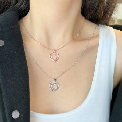 China Nickel-Free Lead-Free High Quality Hollow Double Heart Pendant Necklace Rose Gold Plated S925 Sterling Silver Double Heartnecklace For Women for sale