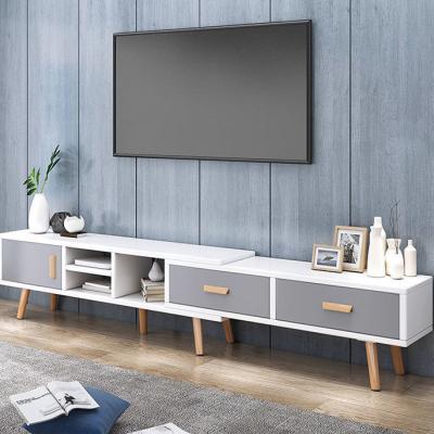 China Eco-friendly Simple Modern TV Stands White Household TV Stand TV Cabinet With Book Shelves for sale