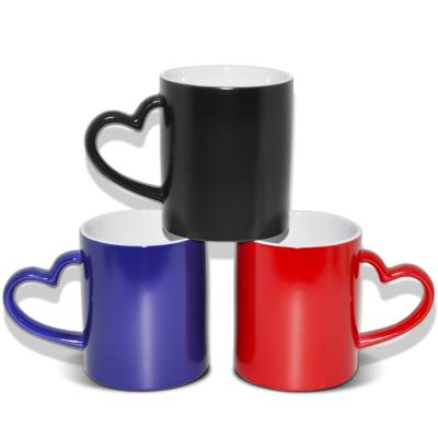 China Viable Magic Heart Handle Color Change Coffee Tea Milk Coffee Mugs Ceramic Hotsale Mugs for sale