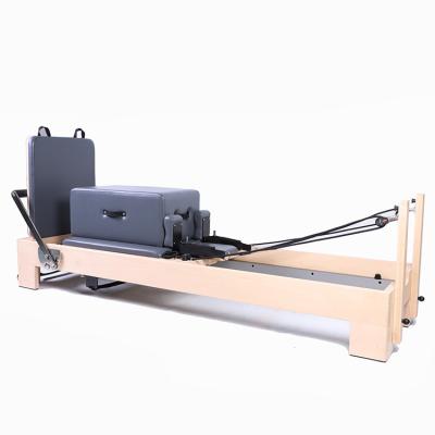 China Durable Manufacturers Supply Yoga Pilates Workouts Equipment Pilates Reformer Machine Wooden Pilates Multi Functional Bed for sale