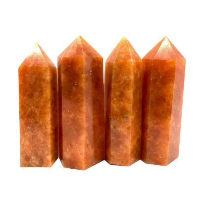 China China wholesale natural orange sunstone healing stone crystal point for home decor for sale