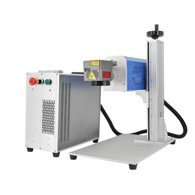 China Air-cooled Hot Sale Metal Co2 Laser Engraving Machine 30w/40w/60w Stainless Steel Laser Engraving Machine For Engraving/caps for sale