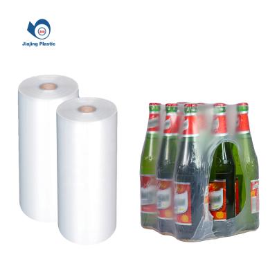 China Excellent Package Strength Beer Packaging Shrink Film Roll 90 100 Micron Wine Heat Shrink Film For Wine Bottles for sale