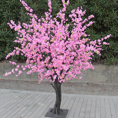 China Small minimalist silk peach blossom artificial tree for shop window decoration for sale