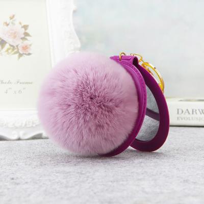 China Europe Wholesale Gifts Compact PU Leather With Fur Ball Mirror Key Chain for sale