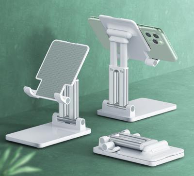 China Foldable Adjustable Double Tube Desktop Folding Adjust Tablet PC Stand For iPad for sale