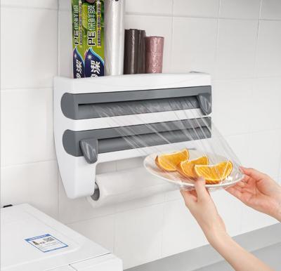 China 4 in 1 multi purpose 4 in 1 multi purpose kitchen towel wall mounted aluminum foil cling film dispenser cutter with holder for sale