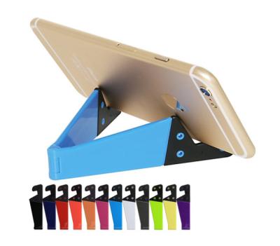 China Adjustable V Shape Mobile Phone Bracket Stand Accessories Desktop Folding Stand for sale