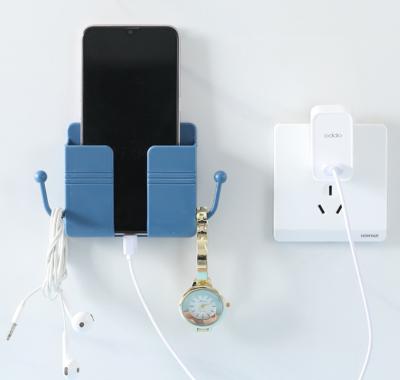 China Dustproof Self Adhesive Mobile Phone Charger Charging Station Wall Mounted Holder for sale