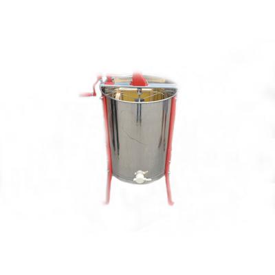 China Beekeeping Equipment Stainless Steel 4 Frame Manual Honey Extractor with Legs and Plastic Honey Gate for sale