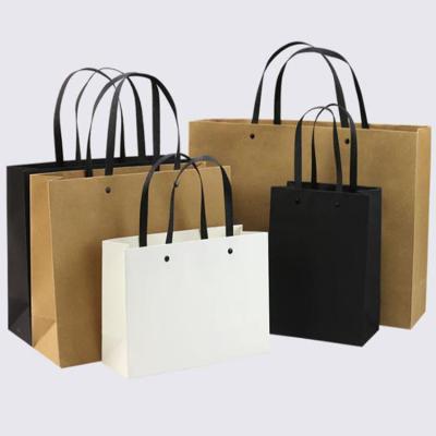 China Custom Logo Shopping Paper Bag China Packaging Suppliers Recyclable Paper Bag Packaging Shop Bags With Handle for sale