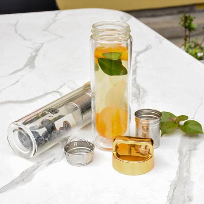 China Sustainable Tea Tumbler With Infuser Doubler WallInsulation Portable Glass Water Bottle With Bamboo Lid for sale