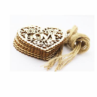 China 100% Eco-friendly Cut Valentine's Day Laser Wooden Heart Shaped Pendants for sale