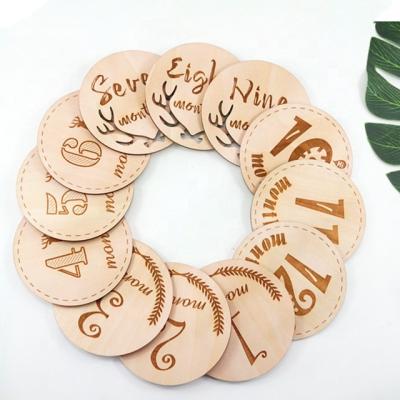 China China Amazon Wooden Baby Milestone Cards Hot Selling Monthly Laser Cut Card English for sale