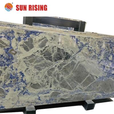 China Modern Reserved Matched Luxury Blue Sodalite Granite For Background Decoration for sale