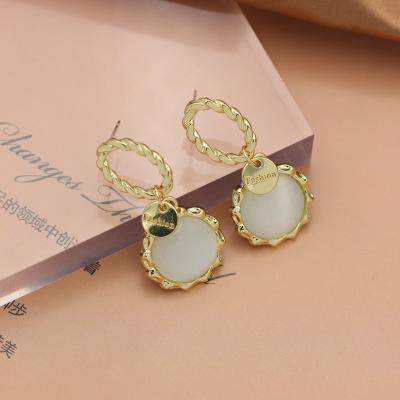 China Casual Roman Cat Eye Earrings Design Line Wrapped Beautiful Jade Boho Style Round Gemstone Earrings Female Jewelry for sale