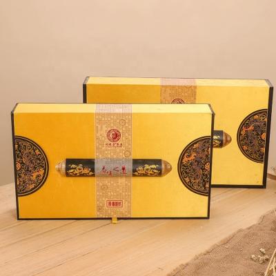 China Custom Materials Logo Recycled Cigar Box Gift Packaging Clamshell Luxury Golden Box With Ribbon for sale