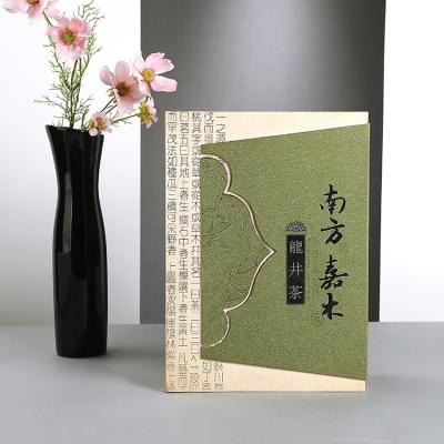 China Recycled Materials Newly Designed Book Shaped One Piece Avocado Green Cardboard Tea Packaging Box Can Be Customized With Logo Size for sale