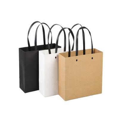 China Recycled Materials Customized Luxury Environmental Brown Kraft Paper Bags Fashion Shopping Bag Protective Food Bag Take Away for sale