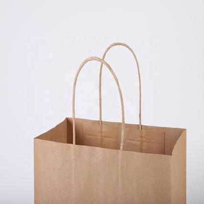 China Factory Wholesale Goods Biodegradable With Handle Kraft Paper Bag Shopping Bag Paper Bags for sale