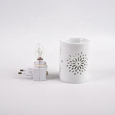 China Garden Decoration Cavity Design Outlet Ceramic Electric Plug-in Wax Oil Heater Incense Oil Burner for sale