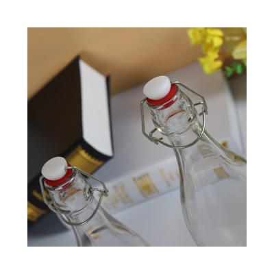 China Storage convenience hot sale at low prices exquisite clear glass beer bottles for beer for sale