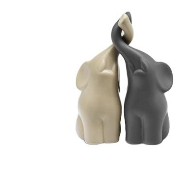 China Worlwide Elephant in Gray Unique Ornaments Modern Ceramic Sculpture in Love Resin Crafts for sale