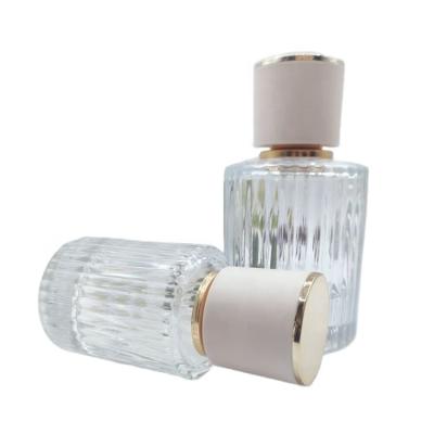 China Cosmetic wholesale luxury 30ml 50ml round perfume bottle perfume spray empty bottles with crimp cap for sale