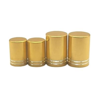 China Non Spill Hot sale 13mm 16mm golden aluminum Glass Bottle Roll On Cap with silver rims for sale