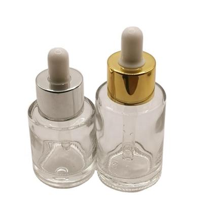 China Cosmetic Luxury 20ml 30ml Essential Oil Serum bottle Flat Shoulder Cylinder Glass Bottle With Dropper for sale