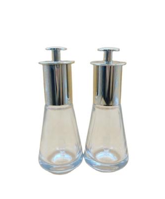 China Cosmetic 30ml Skincare Serum Dropper Foundation Glass bulb Bottle With Thumb Push Button Press Dropper for sale