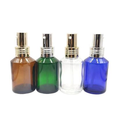 China Cosmetic 60ml clear blue amber green Slant Shoulder Glass airless Lotion Pump Spray Bottle for skin care for sale