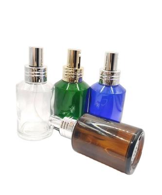 China Cosmetic 100ml colours Glass Angled Lotion Pump Bottle Glass Oil Pressers Bottles with gold silver pump for sale