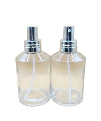 China Cosmetic 200ml transparents Oblique Shoulder Perfume Glass Lotion Spray Bottle Pump Glass Shampoo Bottle for sale