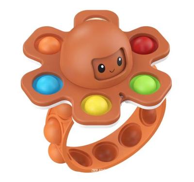 China Face-Changing Sensory Silicone Rotating Finger Squeeze Octopus Toy Gyro Bracelet Stress Reliever Toy Squeeze for sale