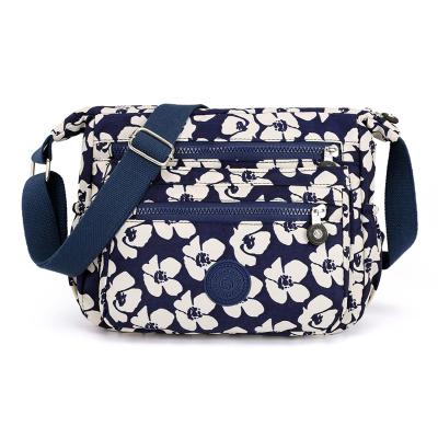 China 2021 Hot Selling Lady Bags Launch Flower PU Lady Bags Nylon Travel Messenger Bag Waterproof Crossbody Shoulder Bag for sale