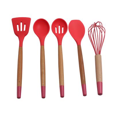 China Sustainable Quality 5pcs Size Silicon Cookware Kitchen Utensil Set Tool Kit With Wooden Handle With Liner for sale