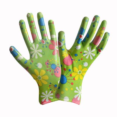 China Oil Proof Guaranteed Unique Printing Quality Polyester Nitrile Gloves Hand Gloves for sale