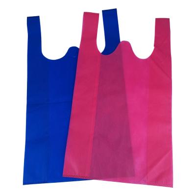 China Wholesale High Quality Custom Nonwoven Handled Colorful Printed Logo T-shirt Bag Tote Shopping for sale