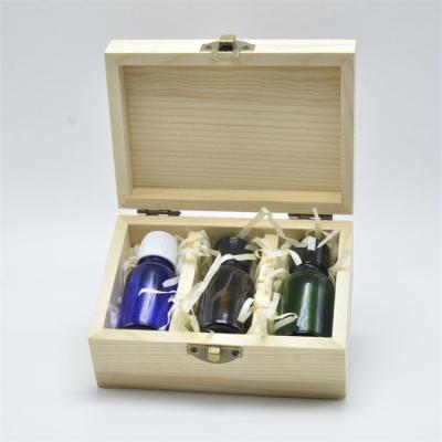 China Handmade Wooden Essential Oil Storage Box 3 pcs 5ml Glass Bottle Wooden Box for sale