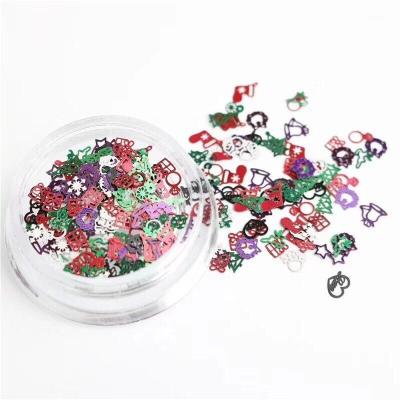 China Easy Apply Ultra-thin Hollow Color Christmas Nail Pieces Glitter Nail Art Decoration Snowflake Metal Nail Pieces for sale