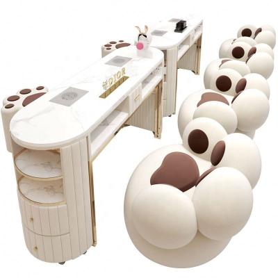 China Modern 2023 GetGold Modern Salon Furniture Nail Table and Chair Set Manicure Nail Table for sale